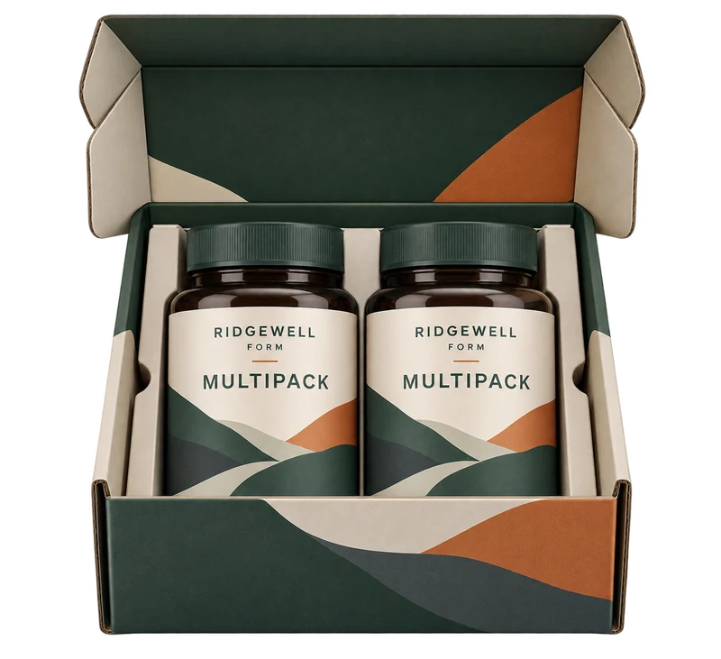 Two sealed supplement bottles inside an open fitted mailer carton concept with fictional RIDGEWELL FORM branding.