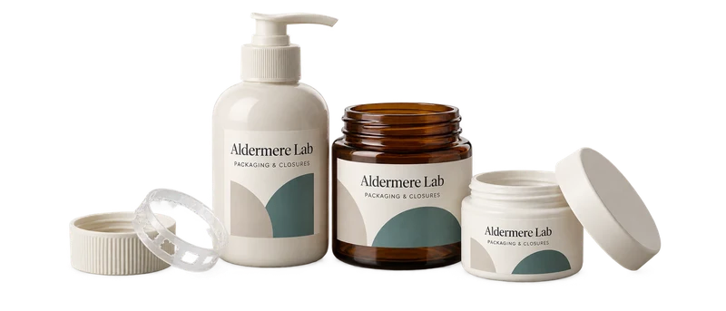 A pump bottle, open jars, caps and tamper band with fictional-brand packaging artwork.