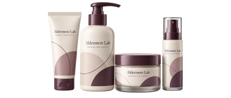 A pump bottle, tube, cosmetic jar and airless bottle with fictional-brand artwork.